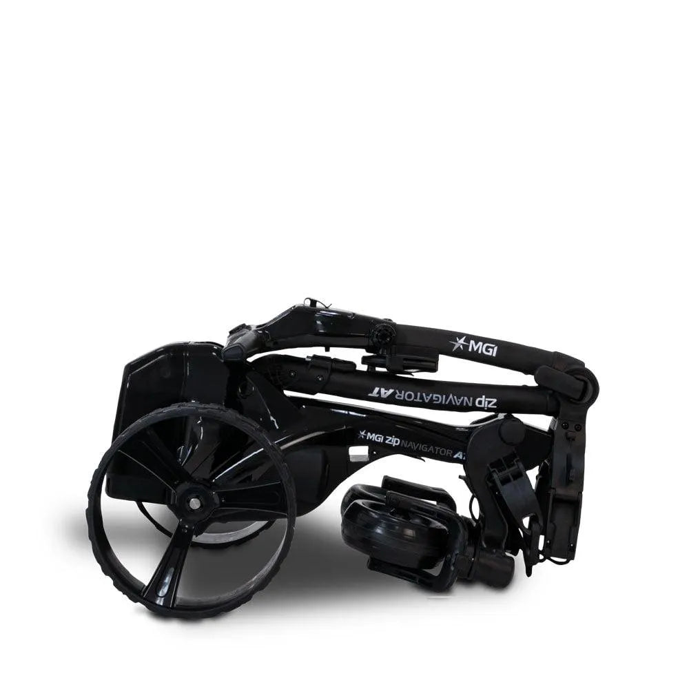 Folded MGI Zip Navigator AT electric all-terrain golf buggy with large wheels