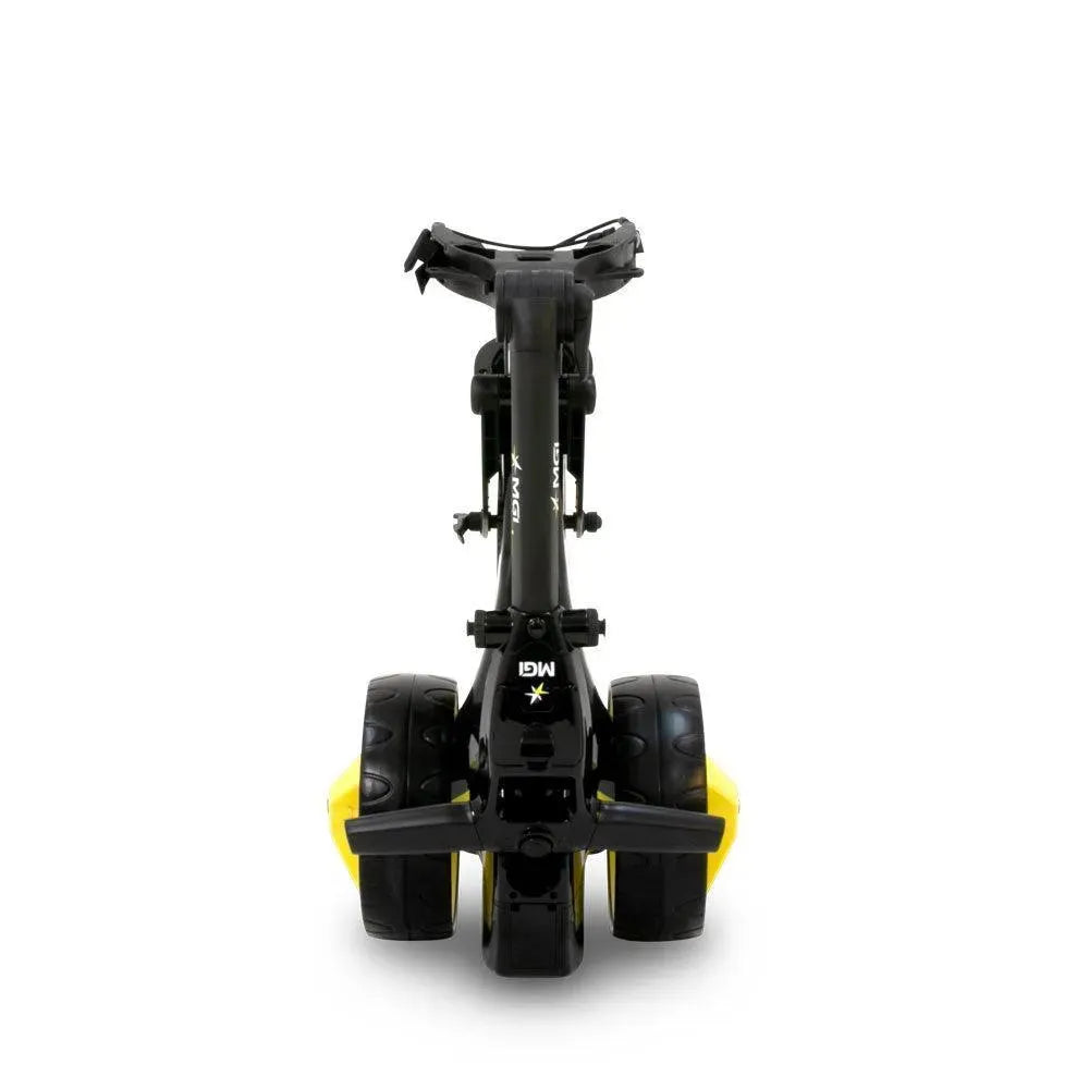 Folded MGI Zip X1 lithium electric golf buggy, black and yellow, rear wheels visible